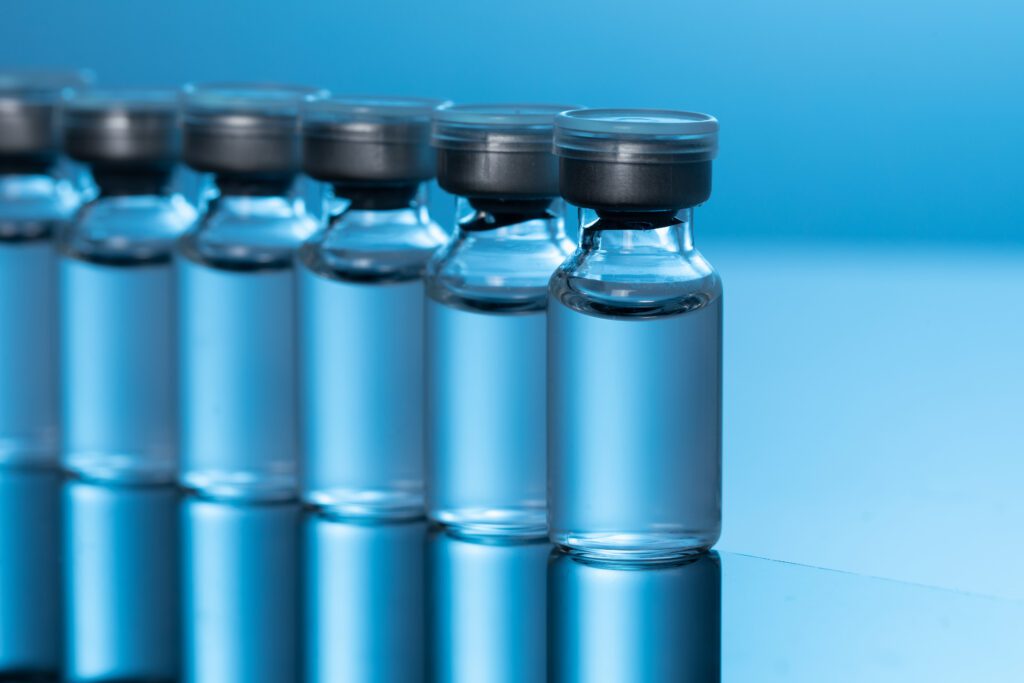 A parent researching peptide therapy advertisements online, representing the confusion many families face when comparing growth hormone options for their child at I Grow Clinic.