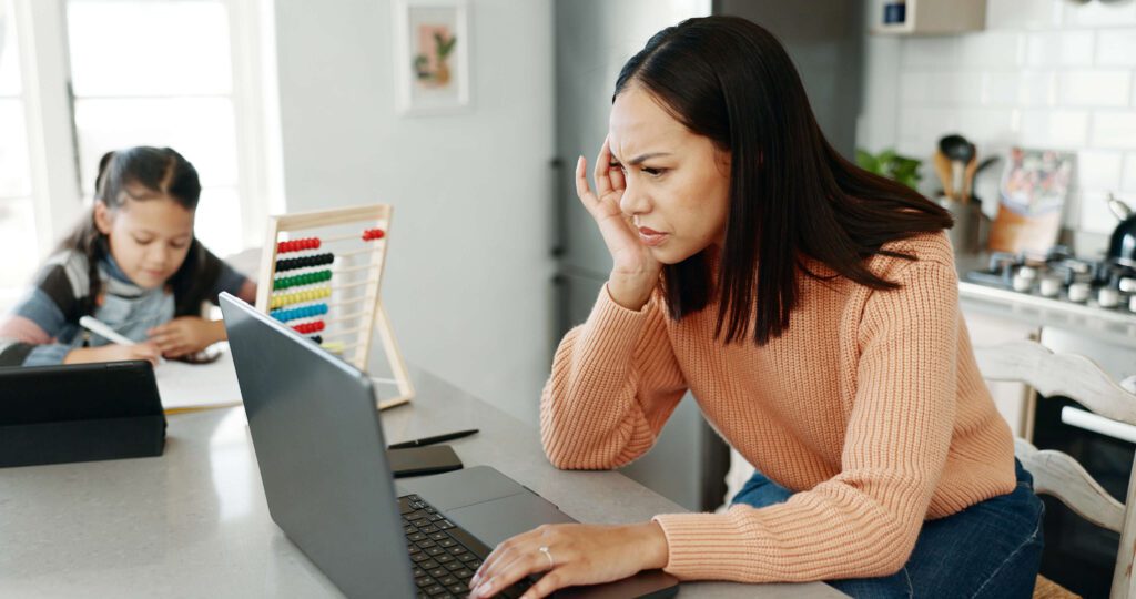 A concerned parent reviewing their child's IGF-1 blood test results at home, unsure what the lab reference range means for their child's growth.