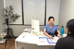 Manager at I Grow Clinic, explaining to a family why pharmaceutical-grade recombinant human growth hormone is the evidence-based standard of care compared to unregulated peptide alternatives.