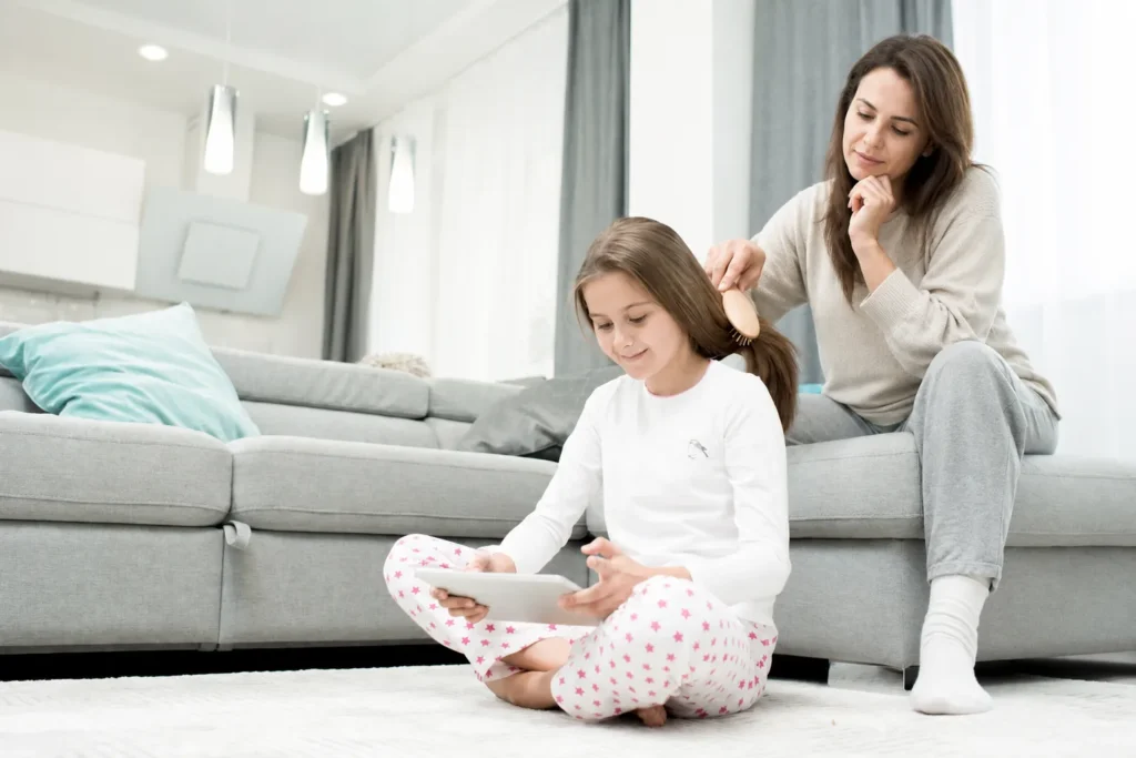 A parent noticing early puberty signs in their child, reflecting the concern many families feel when asking does early puberty affect height.